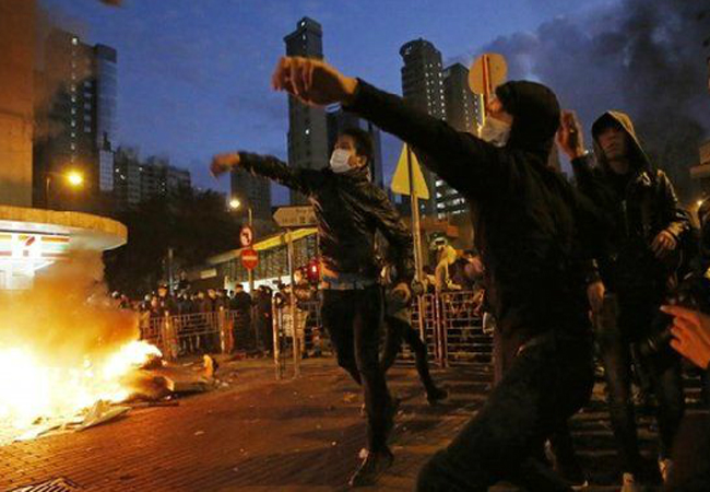Hong Kong to investigate police warning shots at clashes