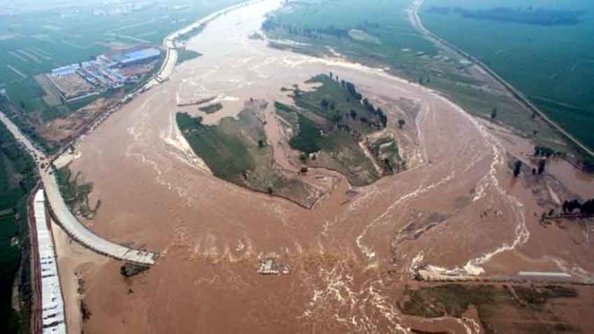 China floods: Roads have been cut and fields flooded in Hebei 150 killed